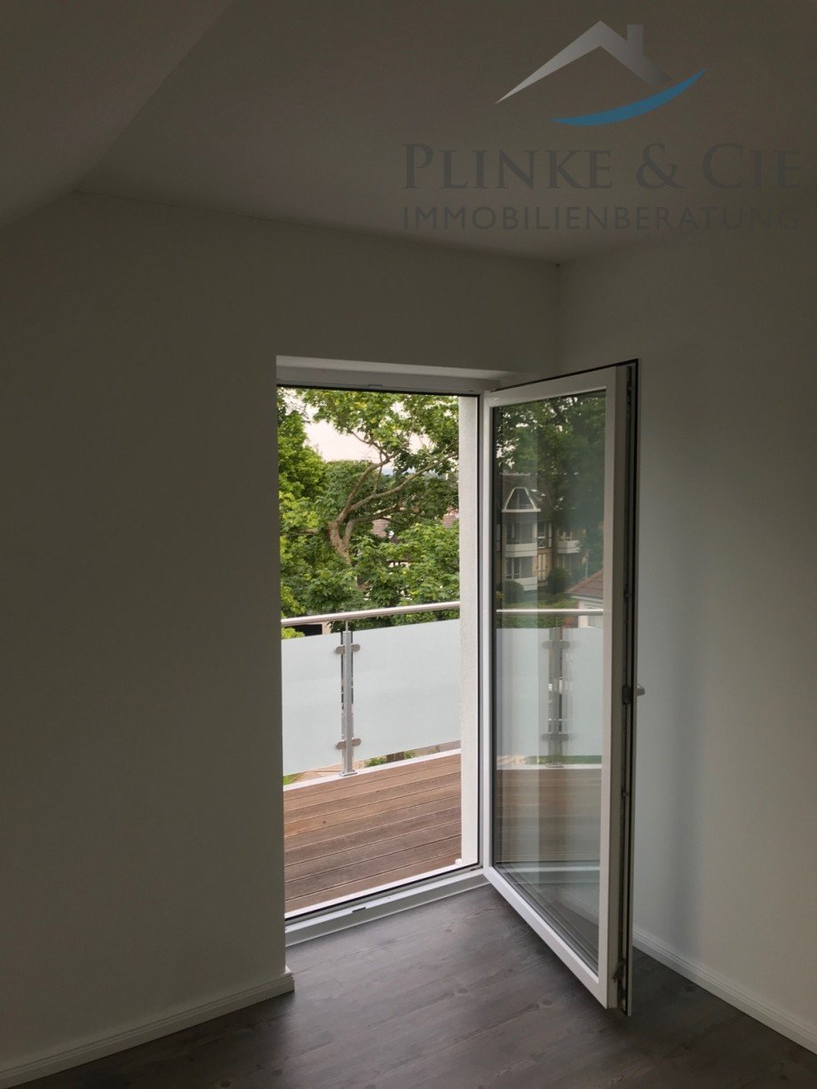 Wohnzimmer & Dachterrasse Dachgeschosswohnung Timmendorfer Strand