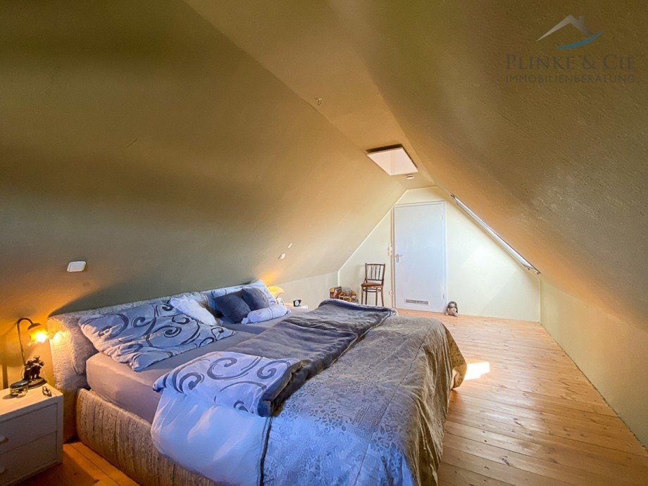 Schlafzimmer DG Einfamilienhaus Stoltenberg