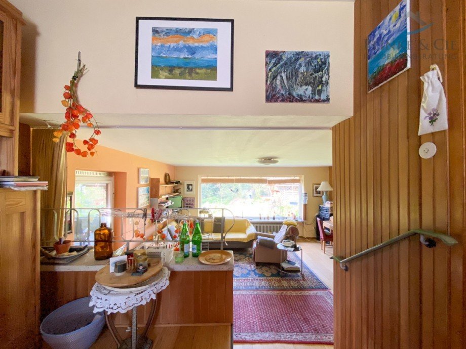 Blick auf das Wohnzimmer und Garten Einfamilienhaus Pl�n