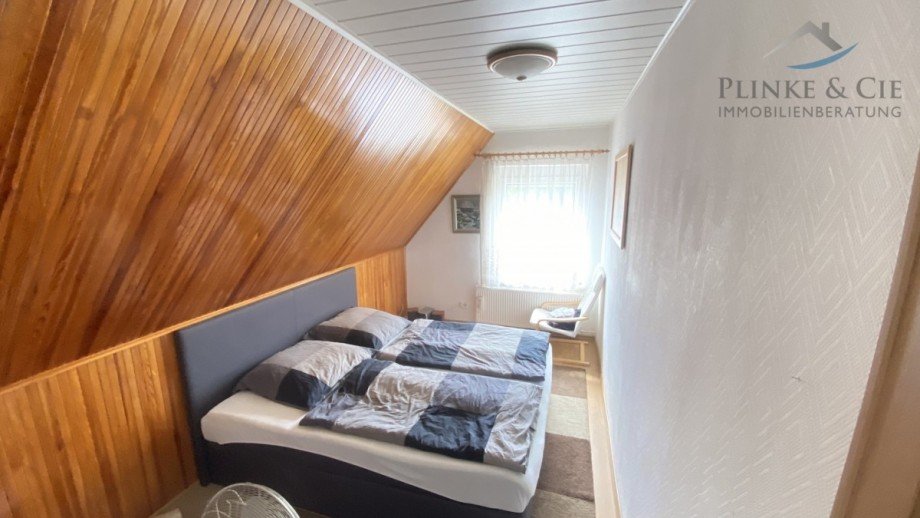 Schlafzimmer 1 im 1.OG Einfamilienhaus Sternberg