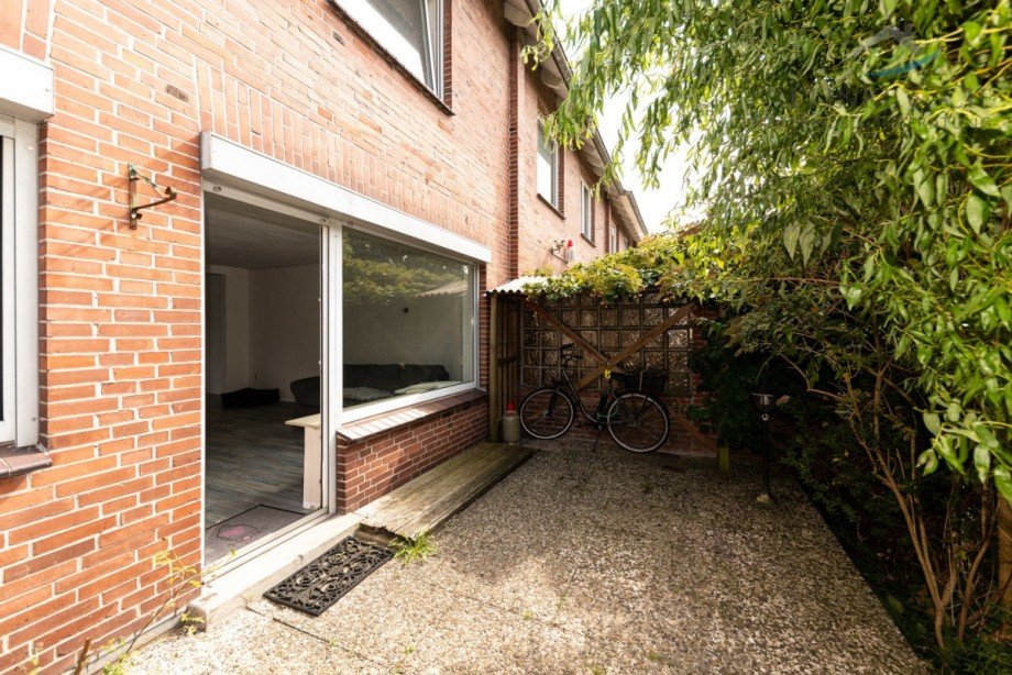 Terrasse mit Ausgang Wohnzimmer Reihenmittelhaus Kiel / Holtenau