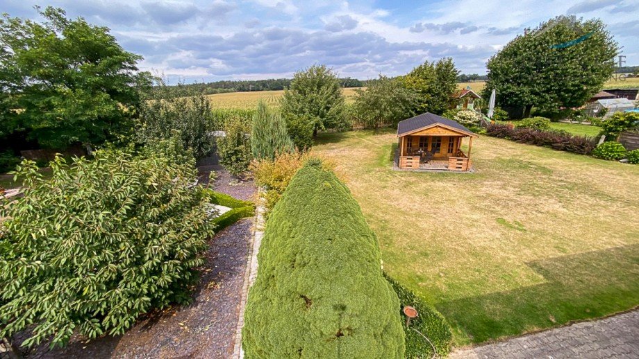 Blick �ber den Garten Einfamilienhaus Wittingen / Boitzenhagen